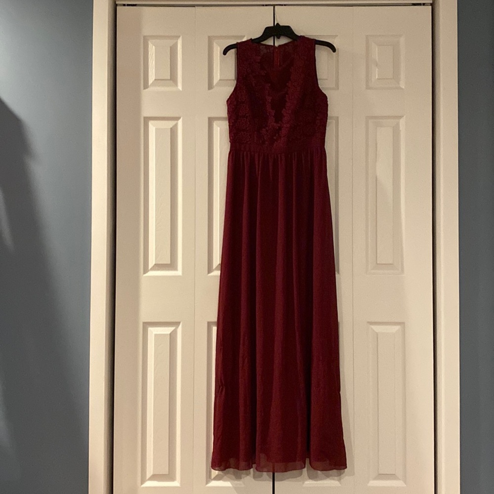 Beautiful Dress from Chi Chi in maroon. Size 12. Plunge lace neckline zip back